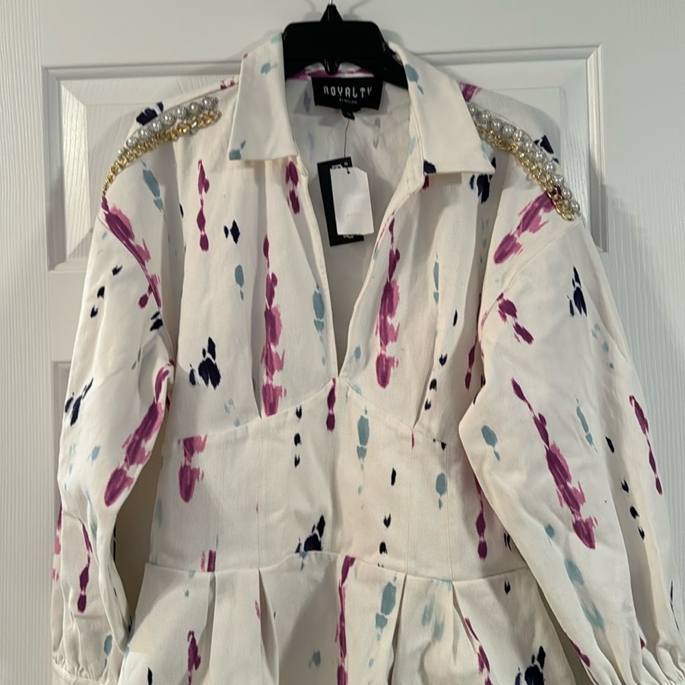 White denim dress was splashes